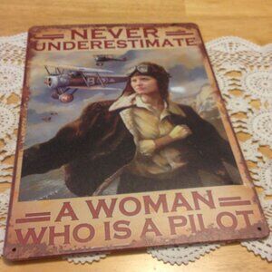 Woman Pilot Wall Art, never underestimate her! Rusted antique look